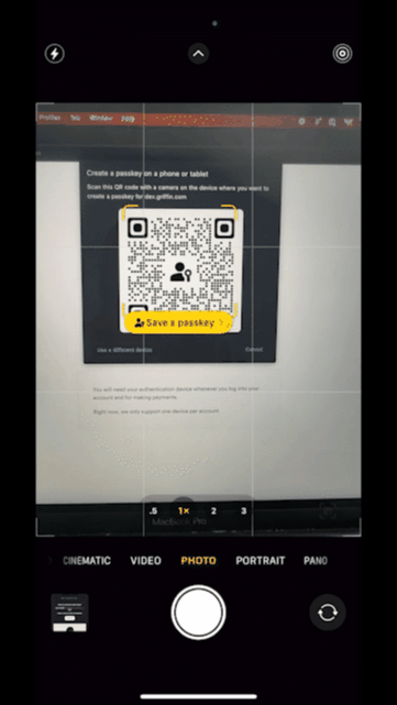 When you open your device's camera and scan the QR code, you will be prompted to save the passkey to your device.